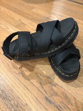 Dr. Martens Black Leather Crisscross Strap Sandals with Yellow Stitching